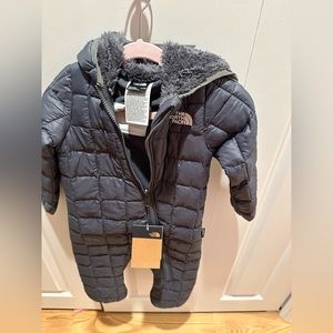 NWT. 12-18 month North Face winter/snow suit. This is a one piece.